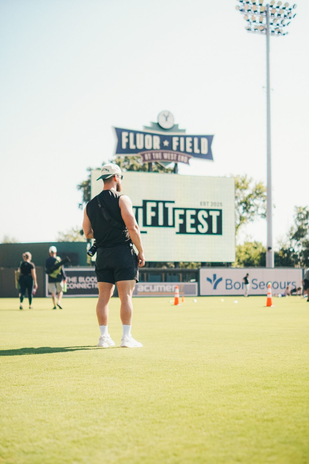 Friends enjoying an outdoor fitness event at GVL Fit Fest in Greenville